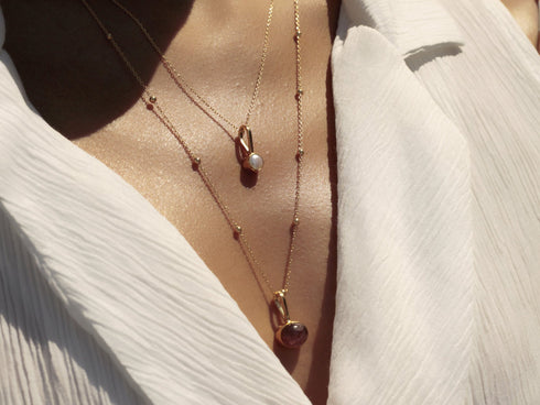 שרשרת פנינה בשילוב עם שרשרת ארוכה